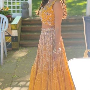 Beautiful mustard colored lengha from designer Shloka Khialani